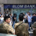 Members of the Lebanese army stand guard outside a Blom Bank branch in Beirut, Lebanon September 14, 2022. REUTERS/Mohamed Azakir