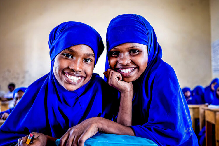 Halimo Abdirahman Ismail, 12 years old, and her friend attend class in Mogadishu, Somalia on 23 January 2021.

On 24 January, we celebrate the International Day of Education. The United Nations General Assembly proclaimed the day to mark our collective responsibility to support all girls and boys to access quality education. 

UNICEF Somalia supports different education activities across the country. Education brings hope of a better future for many children in the country. It promotes peace, tolerance and social inclusion. It is key to eradicating poverty and it equips children to succeed in school, perform productive work, take care of themselves, and lead fulfilling lives.

In Somalia, education is also a lifeline for some children. Going to school can bring stability and help the children to cope with the trauma they have experienced during the conflict. Schools can also protect children from abuse and physical dangers around them.