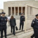 Moroccan policemen stand guard outside the tribunal of Rabat on April 13, 2023, during the trial of three men accused of repeatedly raping an 11-year-old girl. The lawyer for the 11-year-old Moroccan girl from a village near Rabat, raped repeatedly over a period of months and whose rapists received light sentences that outraged the country, urged authorities on April 13 to review laws protecting minors. (Photo by FADEL SENNA / AFP)