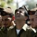 Israeli soldiers mourn during the funeral of their comrade Ilan Sviatkovsky in Rishon Letzion, near Tel Aviv March 28, 2010. Two Israeli soldiers, one of them Sviatkovsky, and two Palestinian militants were killed on Friday in the most deadly clash on the Israel-Gaza frontier since Israel ended an offensive there 14 months ago. REUTERS/Ronen Zvulun (ISRAEL - Tags: CIVIL UNREST POLITICS MILITARY IMAGES OF THE DAY)