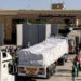 FILED - 21 October 2023, Egypt, Rafah: The first trucks carrying aid to the Gaza Strip cross the Rafah border crossing between Egypt and the Gaza Strip. Twenty trucks carrying medical supplies are to enter the Gaza Strip, the Egyptian TV channel al-Qahera news reports. Photo: Amr Adel/dpa