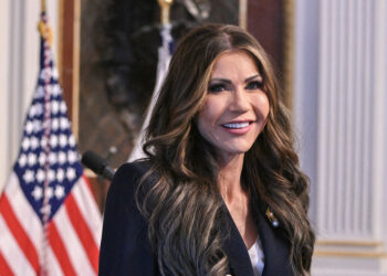 The incoming US Secretary of Homeland Security Kristi Noem smiles as she enters a ceremonial room ahead of her planned swearing in ceremony at the Eisenhower Executive Office Building on January 25, 2025 in Washington, DC. The US Senate on Saturday confirmed South Dakota governor Kristi Noem to lead the Department of Homeland Security (DHS), a key agency in President Donald Trump's push to clamp down on illegal immigration. (Photo by ROBERTO SCHMIDT / AFP)