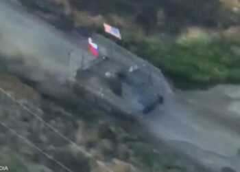 المنشر " تكشف حقيقة رفع دبابة روسية العلم الأميركي" 2025