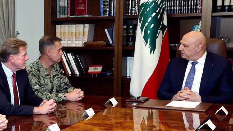 In this photo, released by the Lebanese Presidency press office, Lebanese president Joseph Aoun, right, meets with Adm. Brad Cooper, the top U.S. military commander in the Middle East, centre, at the presidential place in Baabda, east of Beirut, Lebanon, Monday, June 29, 2026. (Lebanese Presidency press office via AP)