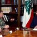 In this photo, released by the Lebanese Presidency press office, Lebanese president Joseph Aoun, right, meets with Adm. Brad Cooper, the top U.S. military commander in the Middle East, centre, at the presidential place in Baabda, east of Beirut, Lebanon, Monday, June 29, 2026. (Lebanese Presidency press office via AP)