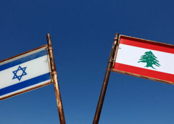 FILE PHOTO: Representations of the Israeli and Lebanese flags at a memorial near the Israel-Lebanon border, outside Metula, Israel, June 27, 2026, after Israel and Lebanon signed a framework agreement following U.S.-mediated talks. REUTERS/Amir Cohen/File Photo