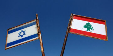 FILE PHOTO: Representations of the Israeli and Lebanese flags at a memorial near the Israel-Lebanon border, outside Metula, Israel, June 27, 2026, after Israel and Lebanon signed a framework agreement following U.S.-mediated talks. REUTERS/Amir Cohen/File Photo