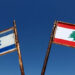 FILE PHOTO: Representations of the Israeli and Lebanese flags at a memorial near the Israel-Lebanon border, outside Metula, Israel, June 27, 2026, after Israel and Lebanon signed a framework agreement following U.S.-mediated talks. REUTERS/Amir Cohen/File Photo