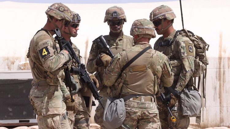 US military personnel participate in the Best Squad Competition at the Buehring base camp in Udairi, in the northwestern region of Kuwait, on May 10, 2023. (Photo by Yasser Al-Zayyat / AFP)