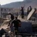 Rescue workers search for victims under the rubble of a building destroyed in an Israeli airstrike in the southern village of Kfar Rumman, Lebanon, Monday, Sept. 7, 2026. (AP Photo/Mohammed Zaatari)
