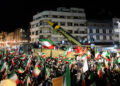 TEHRAN, IRAN - APRIL 21: People gather at Enghelab and Vanak squares to participate in anti-US and anti-Israel demonstrations, waving Iranian flags and chanting slogans on April 21, 2026 in Tehran, Iran. During the ongoing protests, the Iranian Armed Forces displayed ballistic missiles at the demonstration areas. (Photo by Fatemeh Bahrami/Anadolu via Getty Images)